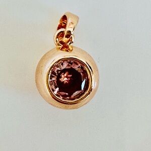 Elegant Gold and Purple Pendant